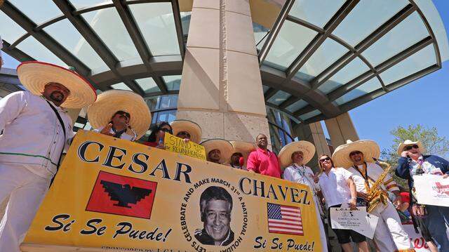In this 2014 photo, members of the Banda Show Paraiso pose for photos outside the TCC Trinity River Campus after a march with about 1,000 participants through downtown Fort Worth to honor the birthday of American labor and civil rights activist Cesar Chavez.